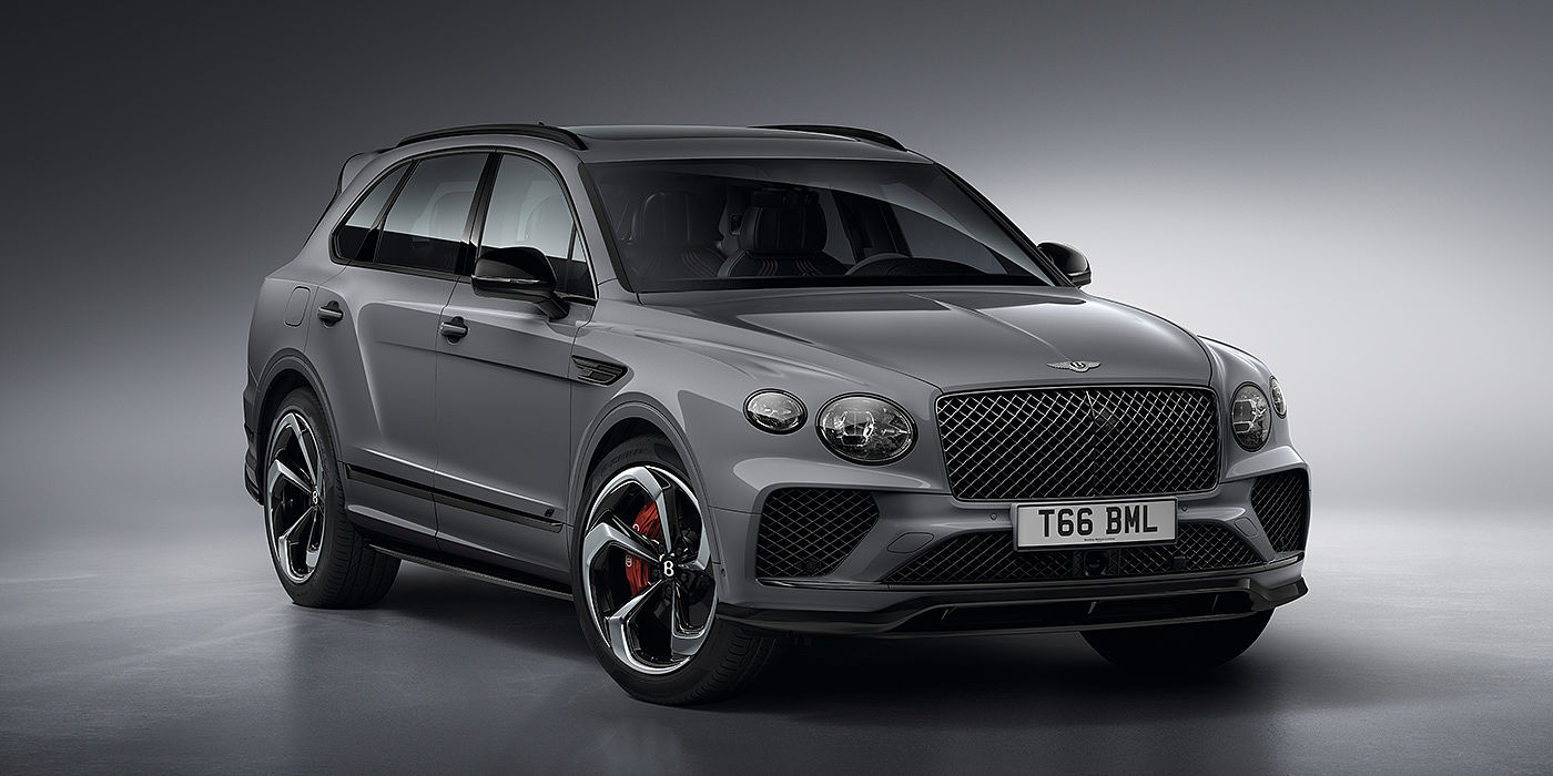 Bentley Hyderabad Bentley Bentayga S in Cambrian Grey paint front three - quarter view with dark chrome matrix grille and featuring elliptical LED matrix headlights. 