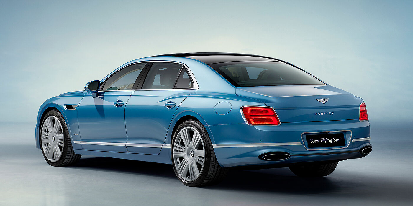 Bentley Hyderabad New Bentley Flying Spur Azure sedan rear view in Light windsor blue by Mulliner paint with 22 inch Azure wheels and chrome exterior details