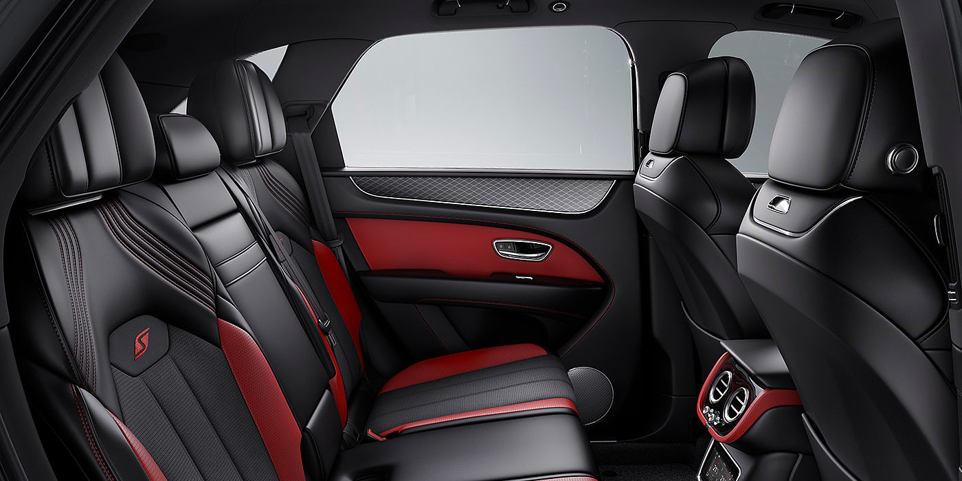 Bentley Hyderabad Bentey Bentayga S interior view for rear passengers with Beluga black and Hotspur red coloured hide.