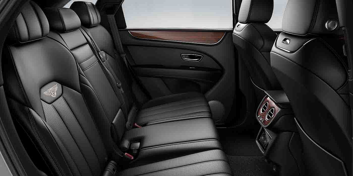 Bentley Hyderabad Bentley Bentayga EWB interior view for rear passengers with Beluga black hide.